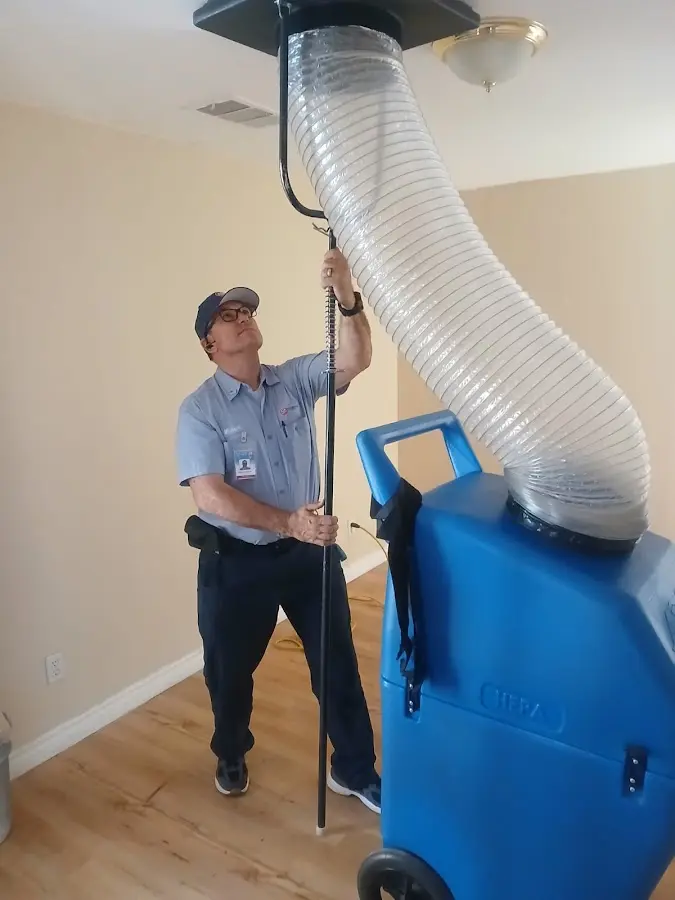 Mini Split Installation technician using HEPA equipment in Gulf Hills